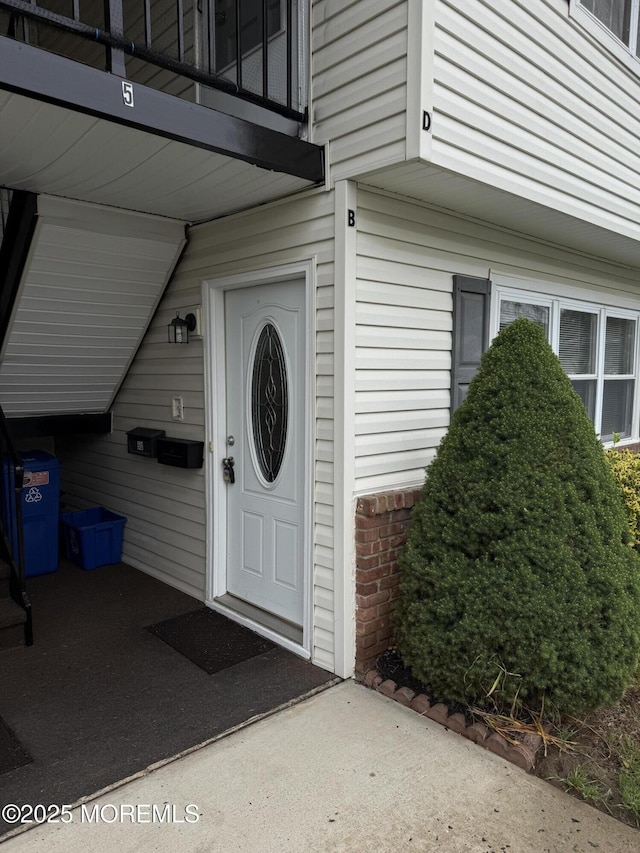 5 Texas Ct Unit B, Matawan, NJ 07747 - doorway to property featuring a balcony