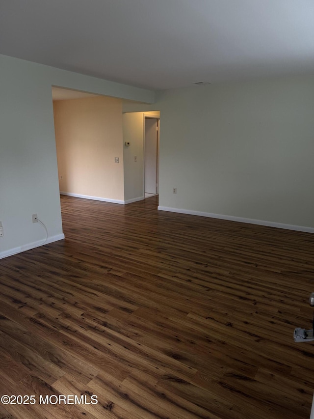 5 Texas Ct Unit B, Matawan, NJ 07747 - spare room featuring dark wood-style flooring and baseboards