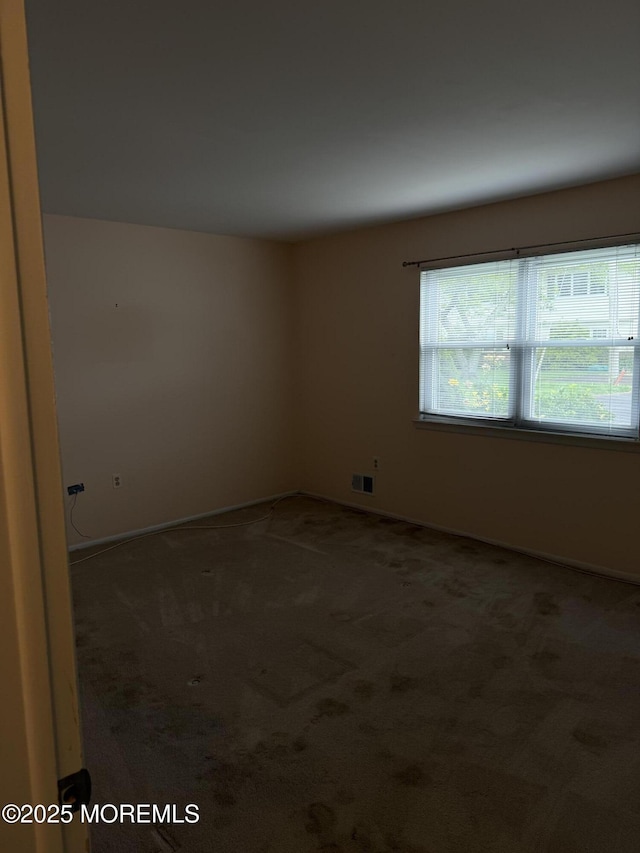 5 Texas Ct Unit B, Matawan, NJ 07747 - unfurnished room featuring carpet floors and baseboards
