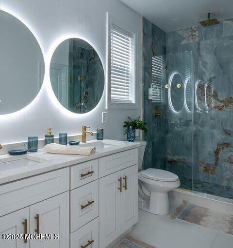 53 Blaine, Seaside Heights, NJ 08751 - bathroom featuring a marble finish shower, double vanity, and toilet