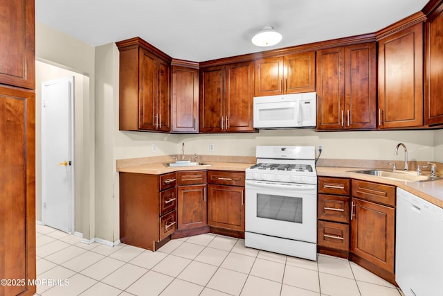 20 Lone Star Ln, Manalapan, NJ 07726 - kitchen with white appliances, a sink, light countertops, and light tile patterned flooring