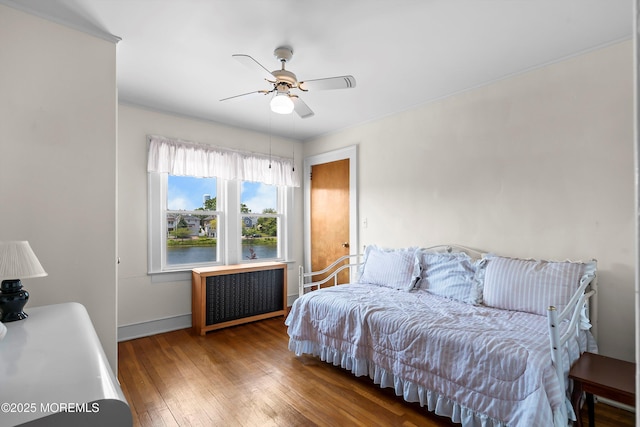 510 Bradley Blvd, Bradley Beach, NJ 07720 - bedroom with radiator, wood-type flooring, baseboards, and a ceiling fan