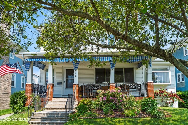 510 Bradley Blvd, Bradley Beach, NJ 07720 - view of front of house featuring a porch and brick siding