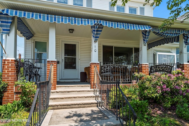 510 Bradley Blvd, Bradley Beach, NJ 07720 - property entrance with a porch and brick siding
