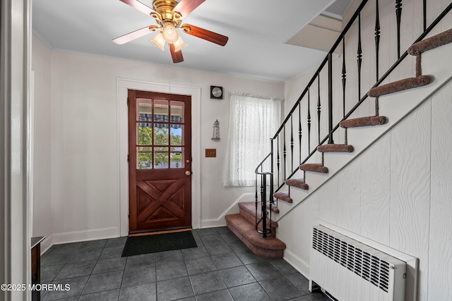 510 Bradley Blvd, Bradley Beach, NJ 07720 - foyer with radiator, baseboards, stairway, dark tile patterned floors, and ceiling fan