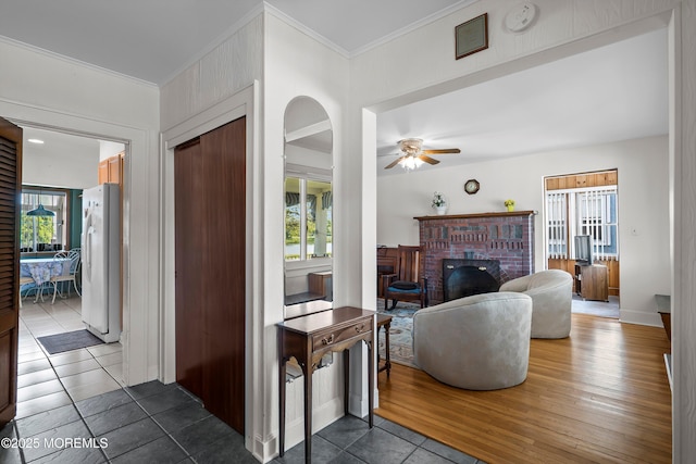 510 Bradley Blvd, Bradley Beach, NJ 07720 - living area with a ceiling fan, ornamental molding, a brick fireplace, and baseboards