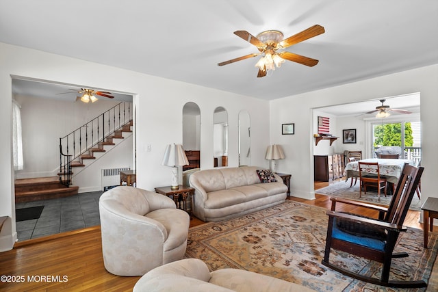 510 Bradley Blvd, Bradley Beach, NJ 07720 - living room featuring ceiling fan, stairs, wood finished floors, and radiator