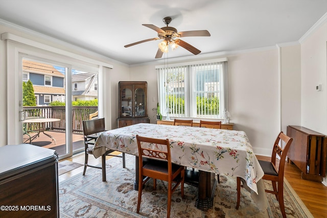 510 Bradley Blvd, Bradley Beach, NJ 07720 - dining space with healthy amount of natural light, light wood-style floors, ceiling fan, crown molding, and baseboards