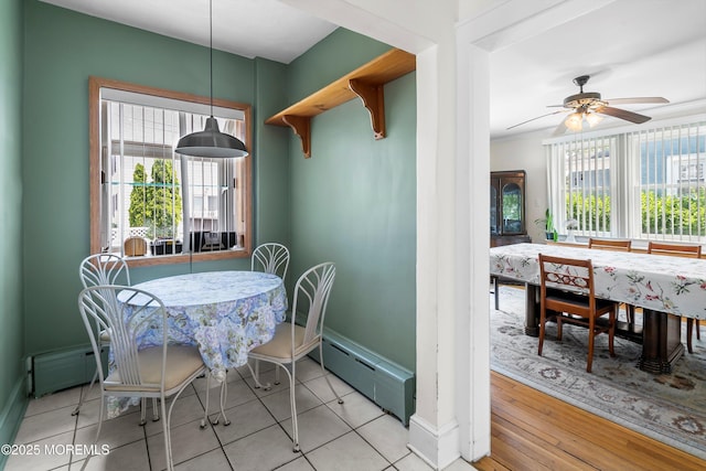 510 Bradley Blvd, Bradley Beach, NJ 07720 - dining room featuring baseboards, ceiling fan, a baseboard radiator, and light tile patterned flooring