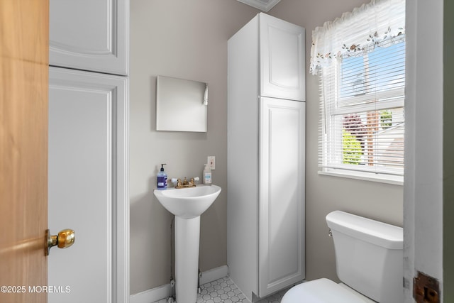 510 Bradley Blvd, Bradley Beach, NJ 07720 - bathroom featuring toilet, baseboards, and a sink