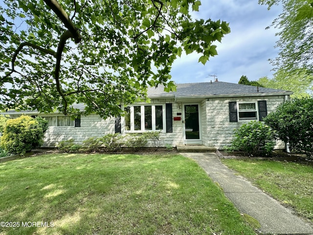 404 Harmony Rd, Middletown, NJ 07748 - ranch-style home featuring a front yard, stone siding, and roof with shingles