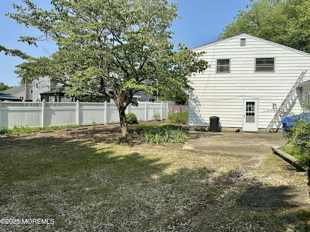 404 Harmony Rd, Middletown, NJ 07748 - back of house with a patio