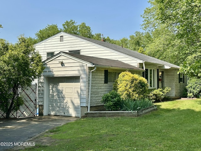 404 Harmony Rd, Middletown, NJ 07748 - view of property exterior featuring a yard, driveway, and a garage