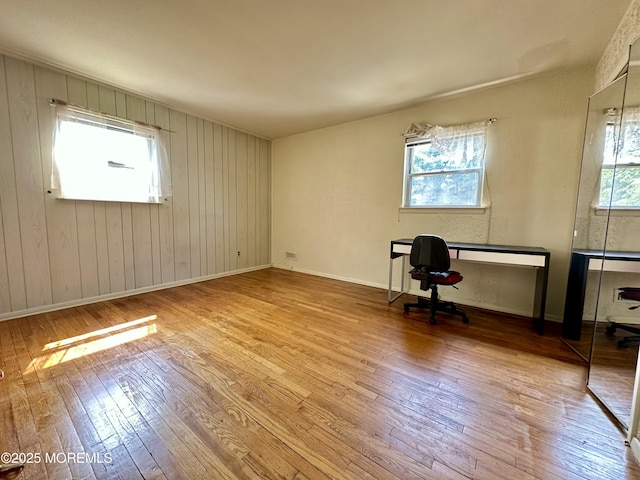 404 Harmony Rd, Middletown, NJ 07748 - unfurnished office with hardwood / wood-style floors, baseboards, and wood walls