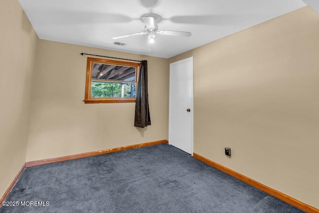 3 Stratton Pl, New Monmouth, NJ 07748 - spare room with baseboards, dark carpet, and a ceiling fan