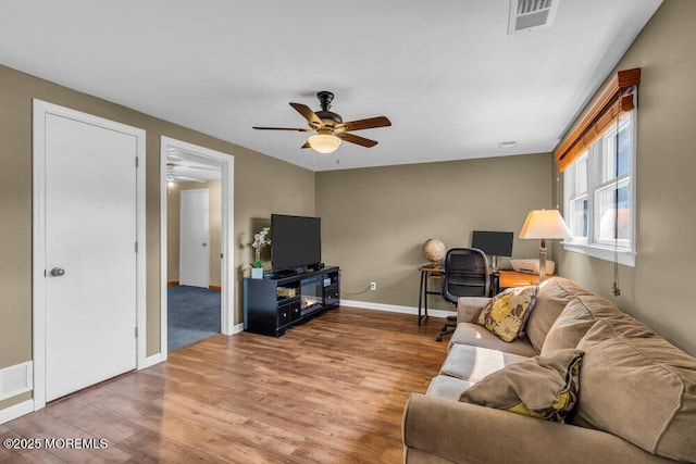 3 Stratton Pl, New Monmouth, NJ 07748 - living area featuring wood finished floors, a ceiling fan, and baseboards