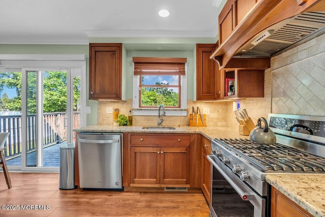 3 Stratton Pl, New Monmouth, NJ 07748 - kitchen with stainless steel appliances, a sink, custom range hood, ornamental molding, and decorative backsplash