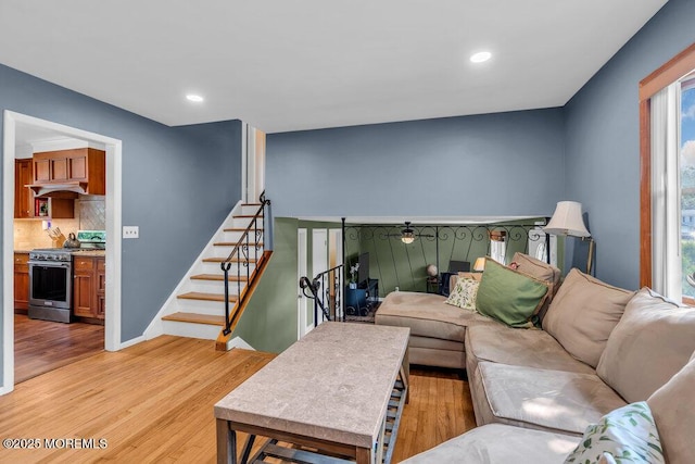 3 Stratton Pl, New Monmouth, NJ 07748 - living area featuring light wood-type flooring, healthy amount of natural light, recessed lighting, and stairs