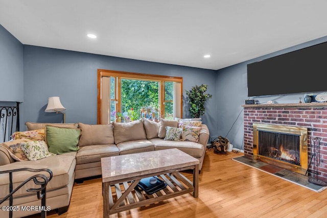 3 Stratton Pl, New Monmouth, NJ 07748 - living room with light wood finished floors, a brick fireplace, and recessed lighting