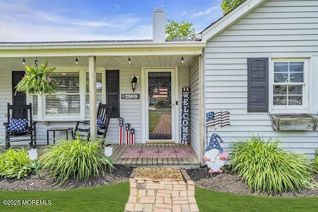 2909 Arthur St, Wall, NJ 07719 - view of exterior entry with a porch