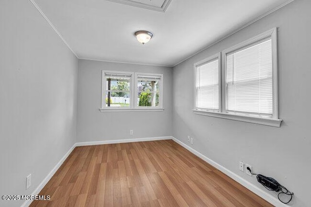 2909 Arthur St, Wall, NJ 07719 - empty room with wood finished floors and ornamental molding