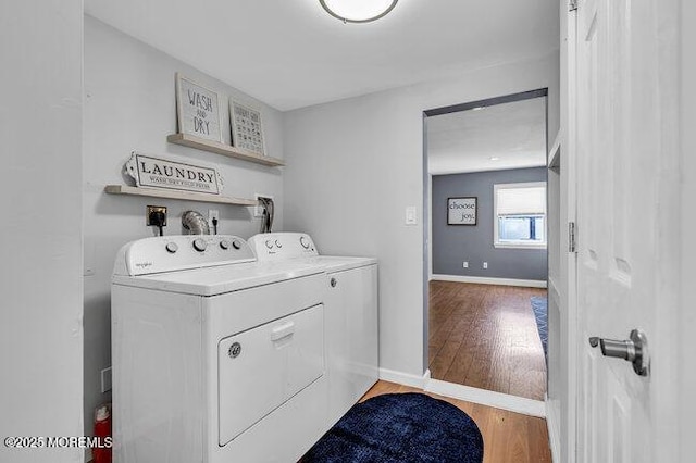 2909 Arthur St, Wall, NJ 07719 - laundry room with washing machine and clothes dryer and light wood-style flooring
