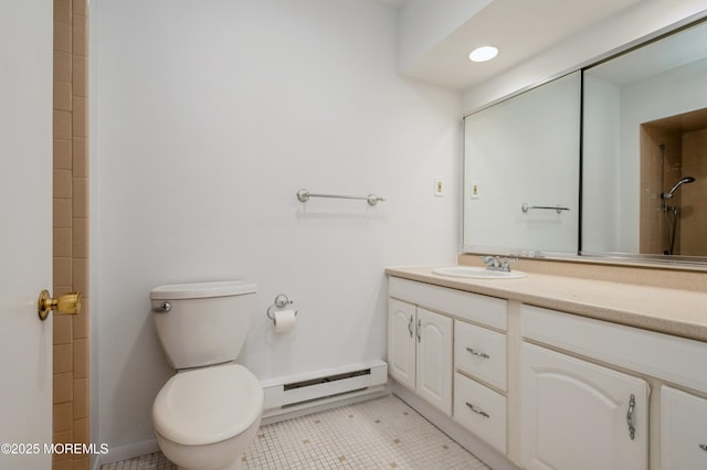 58 Amberly Dr Unit E, Manalapan, NJ 07726 - bathroom with baseboard heating, vanity, tile patterned floors, and toilet