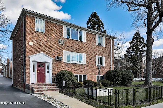 283 Spring St Unit 283B, Red Bank, NJ 07701 - view of front facade featuring brick siding and a wall mounted AC