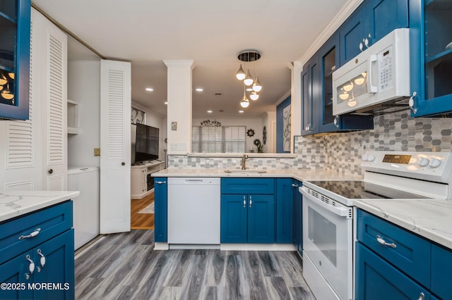 59B Cambridge Cir, Manchester, NJ 08759 - kitchen featuring white appliances, a sink, blue cabinets, decorative backsplash, and dark wood-style floors