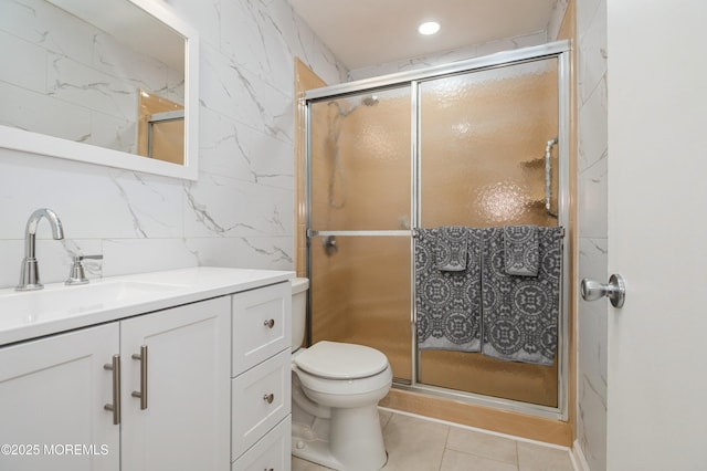 59B Cambridge Cir, Manchester, NJ 08759 - full bathroom with vanity, toilet, tile patterned flooring, a stall shower, and tasteful backsplash