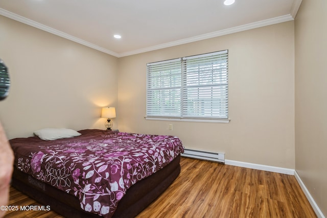 59B Cambridge Cir, Manchester, NJ 08759 - bedroom with baseboard heating, wood finished floors, ornamental molding, recessed lighting, and baseboards