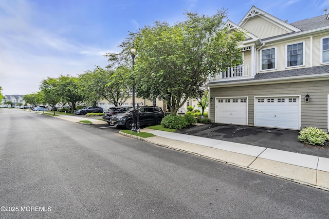66 Shore Dr Unit 20, South Amboy, NJ 08879 - view of front of property with a garage and asphalt driveway