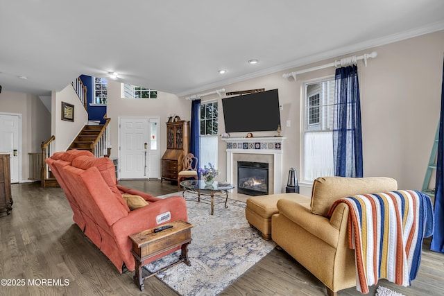 66 Shore Dr Unit 20, South Amboy, NJ 08879 - living room featuring wood finished floors, stairs, crown molding, a fireplace with flush hearth, and recessed lighting
