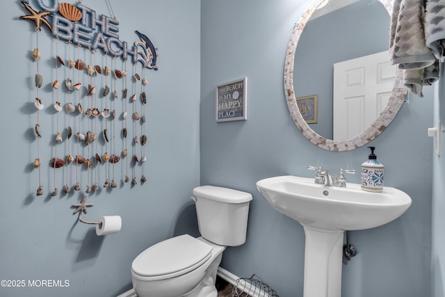 66 Shore Dr Unit 20, South Amboy, NJ 08879 - bathroom featuring toilet and baseboards