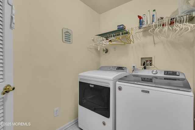 66 Shore Dr Unit 20, South Amboy, NJ 08879 - laundry area featuring washing machine and clothes dryer and baseboards