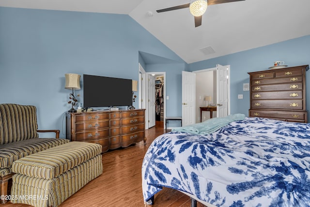 66 Shore Dr Unit 20, South Amboy, NJ 08879 - bedroom with vaulted ceiling, wood finished floors, a closet, a spacious closet, and a ceiling fan