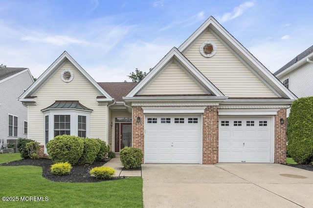 39 Barton Creek Rd, Jackson, NJ 08527 - traditional home with driveway, brick siding, and a garage