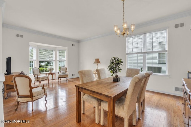 39 Barton Creek Rd, Jackson, NJ 08527 - dining area featuring a chandelier, light wood-type flooring, and ornamental molding