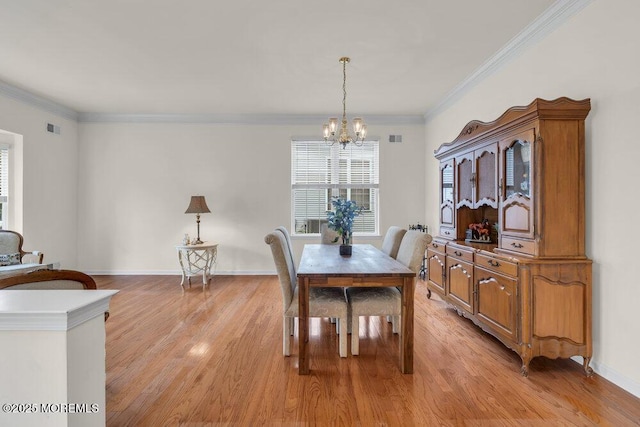 39 Barton Creek Rd, Jackson, NJ 08527 - dining space featuring a chandelier, light wood-style floors, and crown molding