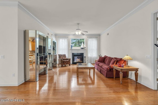 39 Barton Creek Rd, Jackson, NJ 08527 - living area with light wood-type flooring, a fireplace, a ceiling fan, and crown molding