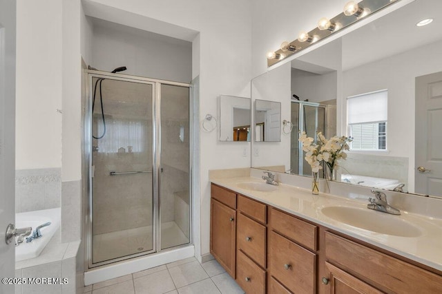39 Barton Creek Rd, Jackson, NJ 08527 - full bath with double vanity, tile patterned floors, a shower stall, and a garden tub