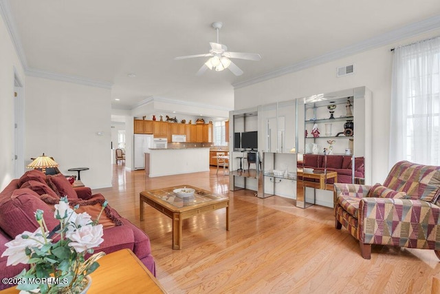39 Barton Creek Rd, Jackson, NJ 08527 - living room with ornamental molding, a ceiling fan, and light wood finished floors