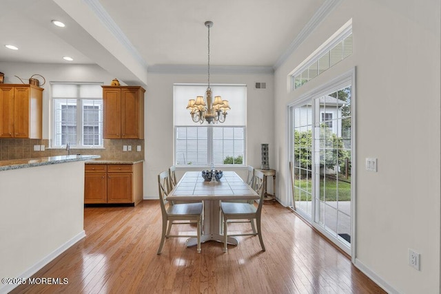39 Barton Creek Rd, Jackson, NJ 08527 - dining area with a chandelier, light wood finished floors, ornamental molding, and recessed lighting
