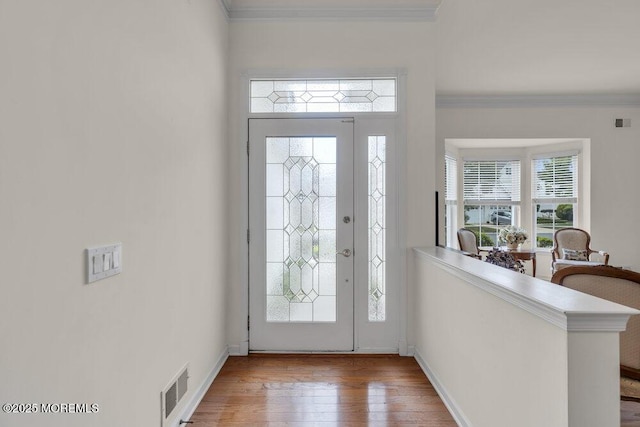 39 Barton Creek Rd, Jackson, NJ 08527 - entrance foyer featuring wood finished floors and crown molding