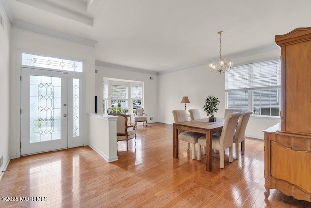 39 Barton Creek Rd, Jackson, NJ 08527 - dining area featuring a chandelier, light wood finished floors, and ornamental molding
