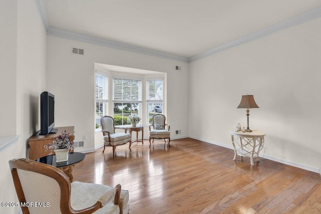 39 Barton Creek Rd, Jackson, NJ 08527 - sitting room featuring crown molding and light wood-style floors