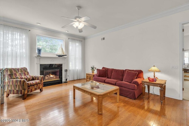 39 Barton Creek Rd, Jackson, NJ 08527 - living room featuring a fireplace, ceiling fan, light wood-style flooring, and crown molding