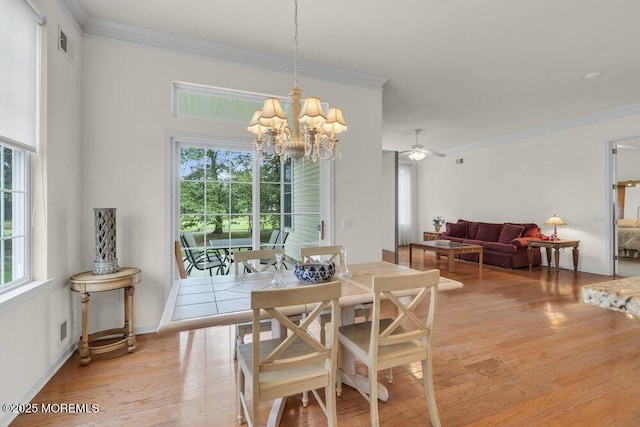 39 Barton Creek Rd, Jackson, NJ 08527 - dining space featuring a chandelier, light wood-style flooring, crown molding, and ceiling fan