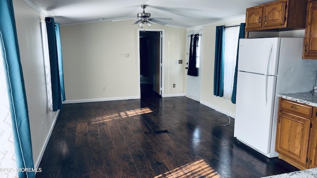 6 Monique Cir, Hazlet, NJ 07730 - kitchen with freestanding refrigerator, dark wood-style floors, ceiling fan, brown cabinets, and baseboards