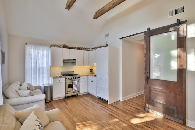 142 Heck Ave, Ocean Grove, NJ 07756 - living room featuring a barn door, beamed ceiling, light wood finished floors, high vaulted ceiling, and baseboards